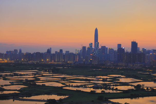 HK Countryside sunset, rice field modern office buildings - Photo, Image
