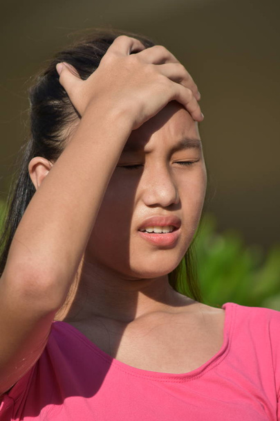 Young Asian Female With Headache - Valokuva, kuva