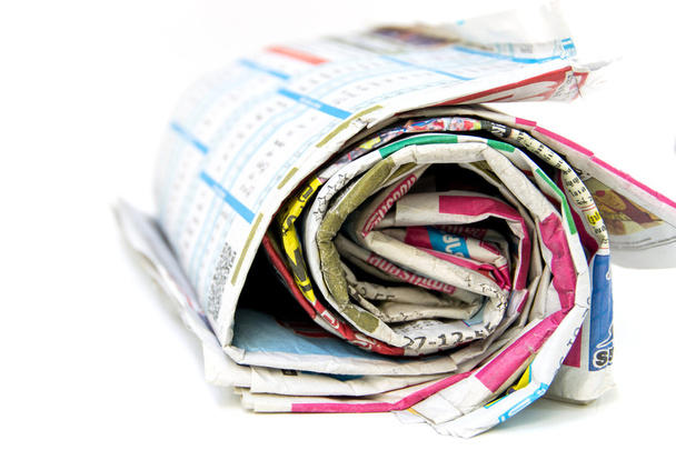 Rolo de jornais, isolado sobre fundo branco
 - Foto, Imagem