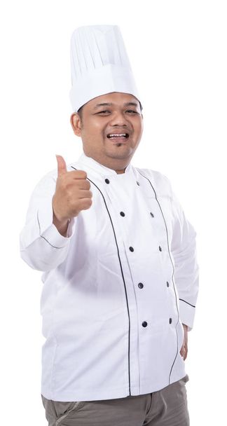 retrato de joven asiático chef sonrisa mientras mano pulgar hacia arriba
  - Foto, Imagen