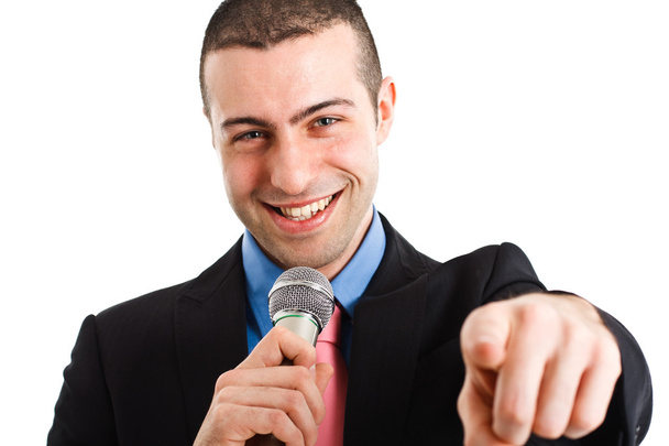Man holding a microphone - Фото, изображение