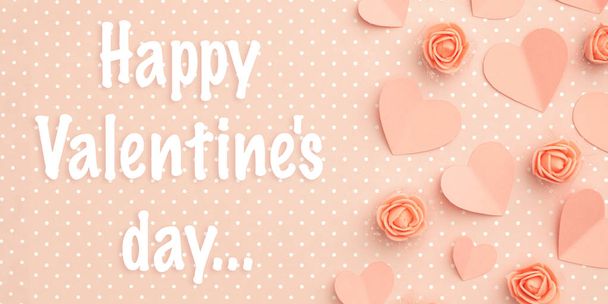 Happy Valentines Day greeting card decorated paper hearts and flowers coral floral rose flat lay on living coral color background. Top view - Photo, Image