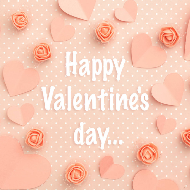 Happy Valentines Day greeting card decorated paper hearts and flowers coral floral rose flat lay on living coral color background. Top view - Photo, Image