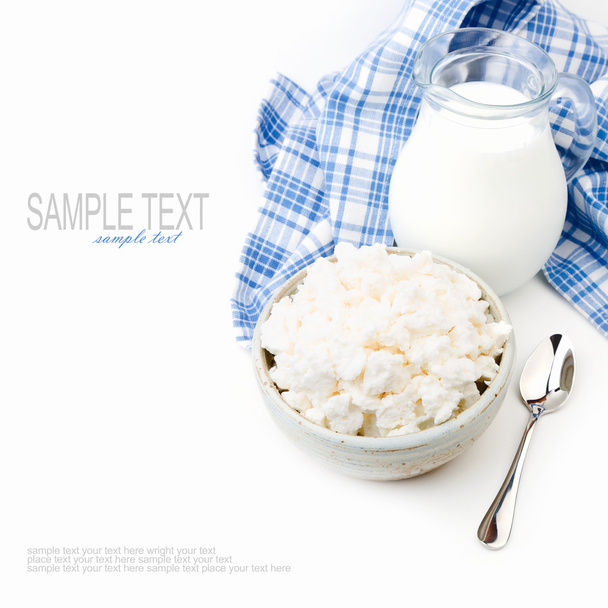 Cottage cheese and milk on white background - Foto, Imagen
