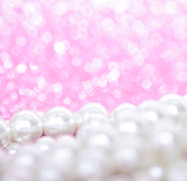 Pile of pearls on pink festive background - Photo, Image