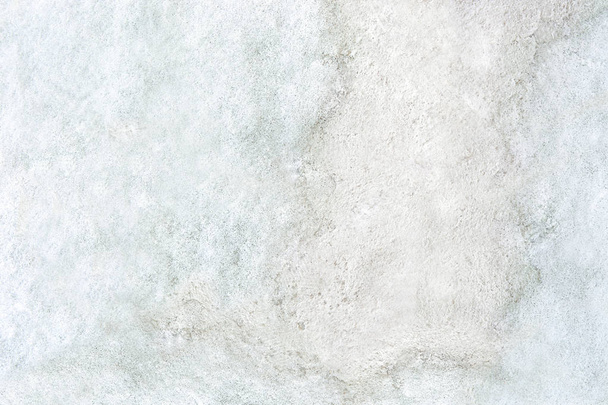 Snow texture frame on white concrete background. Outdoor old floor covered with snow. - Foto, Bild