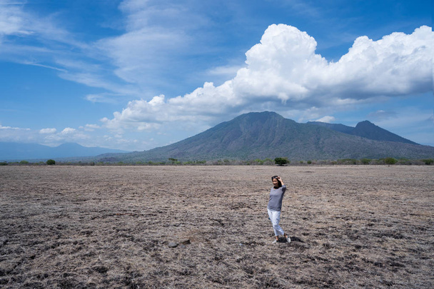 woman in dry landscape savanna - Fotó, kép