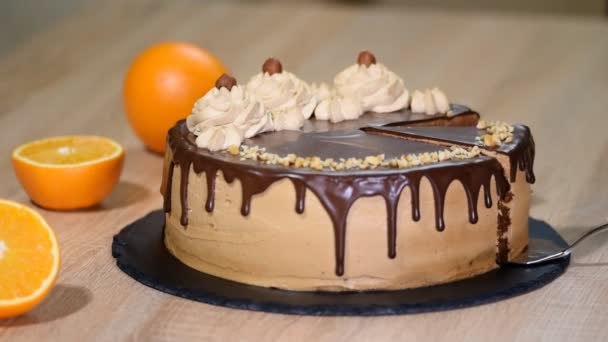 Chocolate cake with hazelnut. Piece of homemade cake. - Footage, Video