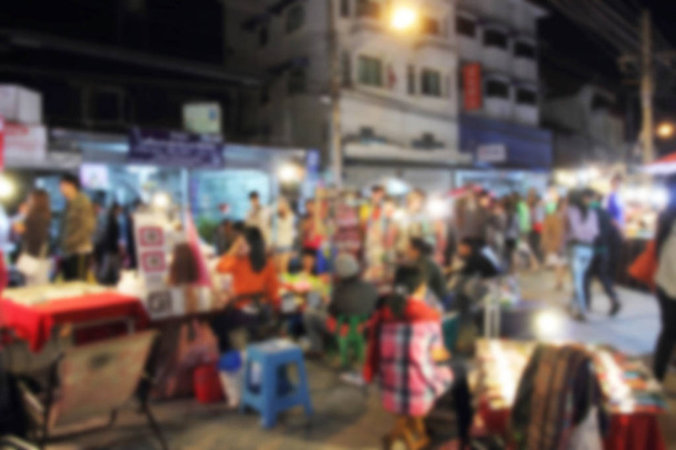 Abstract blur of market walking street at night. - Photo, Image