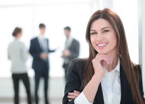 smiling business woman on blurred office background - Photo, image