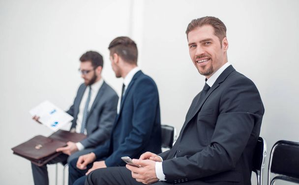 confident businessman .sitting in the office reception - Foto, Imagem