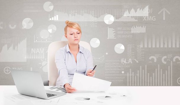 Business person sitting at desk with report analyze concept - Zdjęcie, obraz