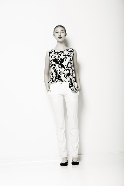 Glamour. Fashion Model in Modern White Trousers and Shirt. Elegance - 写真・画像