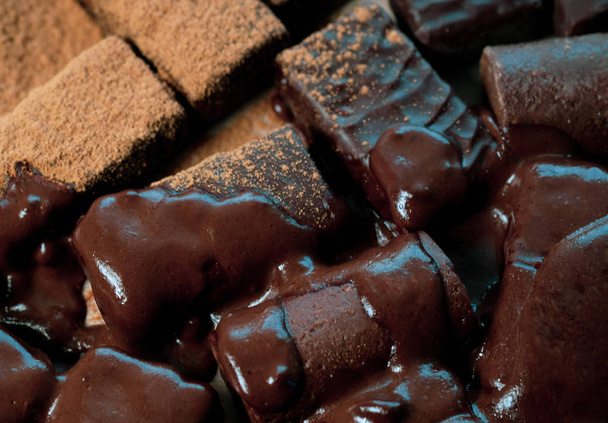 Chocolate candies background, macro shot - Φωτογραφία, εικόνα