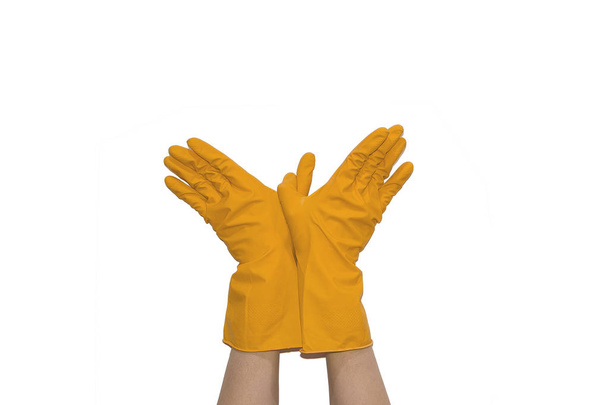 Two hands in orange gloves show gesture of the bird on white isolated background - Foto, Imagem