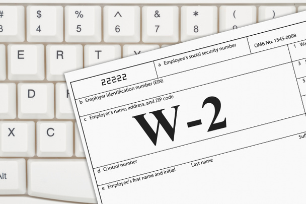 Nás federální daňové formuláře daně z příjmu W2 na klávesnici - Fotografie, Obrázek