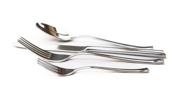 Glanzende bestek, vork, mes geïsoleerd op witte achtergrond - Foto, afbeelding