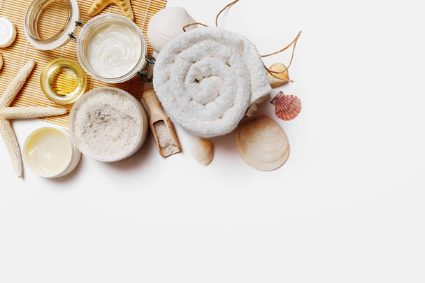 Beauty and spa wellness products and toiletries on white paper background. Space for text. Flat lay. - Foto, afbeelding