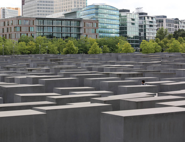 Berlin, Germany - August 19, 2017: Memorial to the Murdered Jews of Europe with immense blocks of cement - Fotoğraf, Görsel