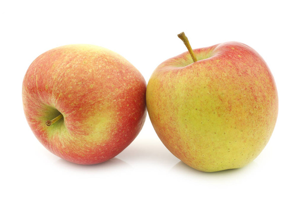 fresh Maribelle apples on a white background - 写真・画像