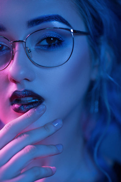 Sexy woman in glasses with evening makeup - Photo, Image