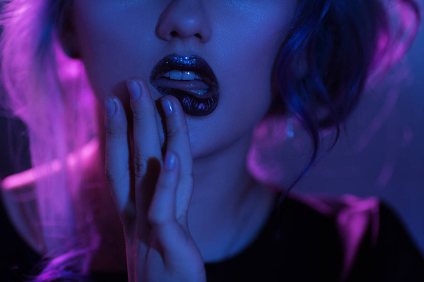 Makeup with red lips. Touching red lips - Valokuva, kuva