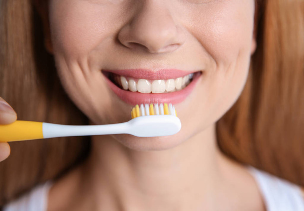 Smiling woman with toothbrush, closeup. Dental care - Φωτογραφία, εικόνα