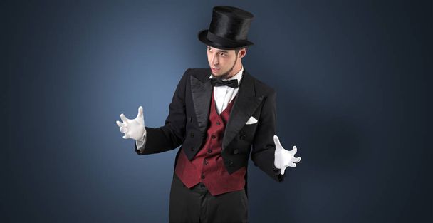 Magician holds something invisible  - Fotó, kép