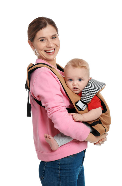 Woman with her son in baby carrier on white background - Photo, Image