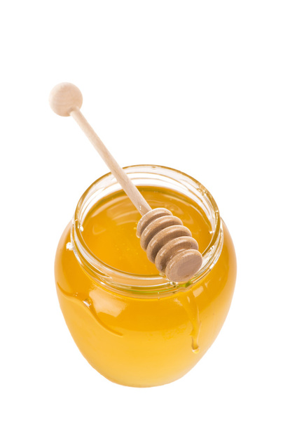 Honey in bank isolated by the white - Photo, Image
