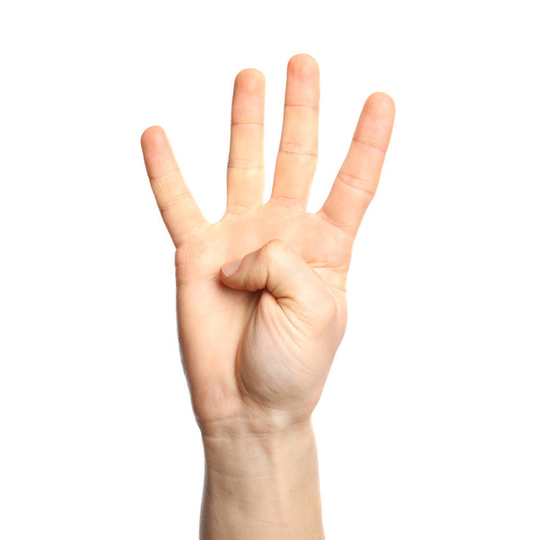 Man showing number four on white background, closeup. Sign language - 写真・画像