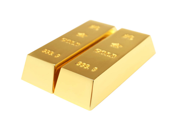 Precious shiny gold bars on white background - Foto, afbeelding