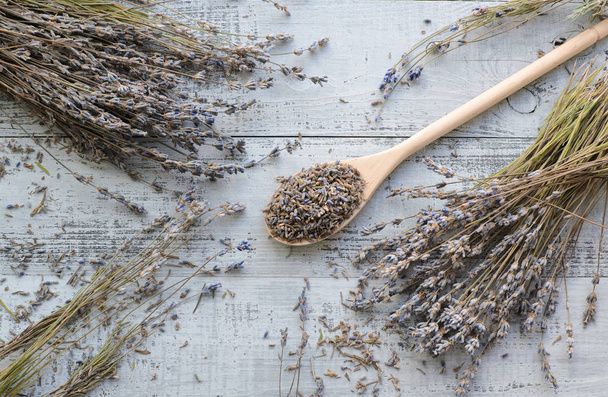 natural dry lavender flowers in big spoon - Fotografie, Obrázek