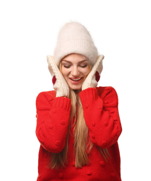 Portrait of emotional young woman in stylish clothes on white background. Winter atmosphere - Foto, afbeelding