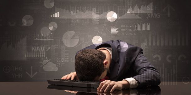 Businessman sleeping with charts, graphs and reports concept - 写真・画像