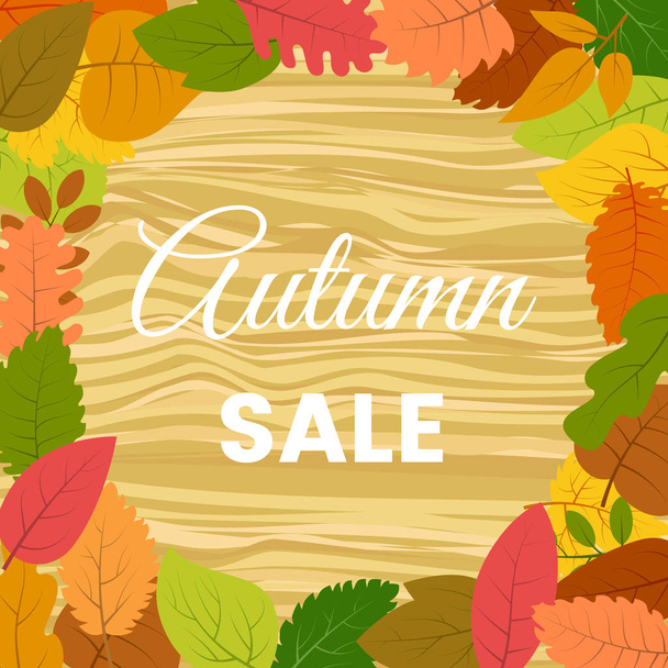 Autumn leaves on a wooden table and the inscription Autumn Sale - Vector, Image