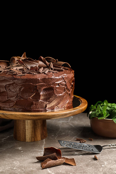 Composition with tasty homemade chocolate cake on table - Fotó, kép
