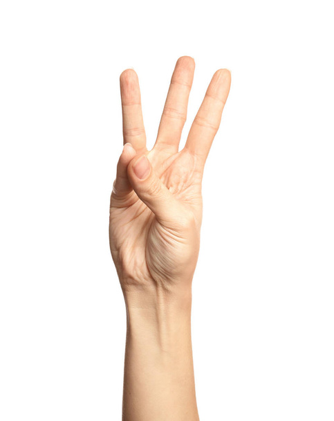 Woman showing number six on white background, closeup. Sign language - Zdjęcie, obraz