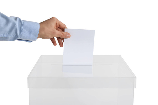 Man putting his vote into ballot box on white background, closeup - Foto, immagini