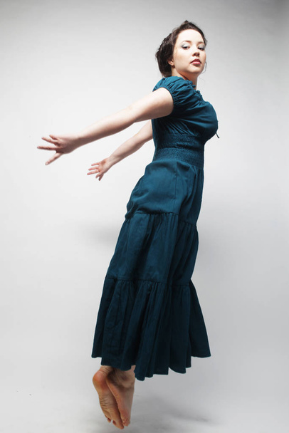 Young charming female in blue dress - Zdjęcie, obraz