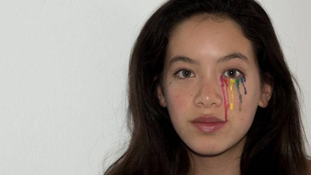 Young Asian teen with colorful tear drop make up - Fotó, kép