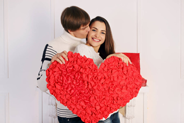 Man and woman holding a big beautiful heart - Photo, Image