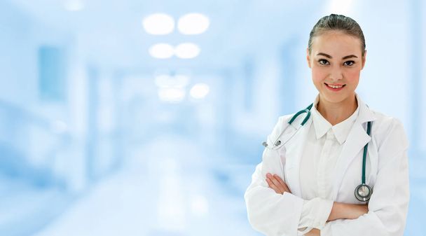 Woman doctor working at the hospital office. Medical healthcare and doctor staff service. - Photo, Image