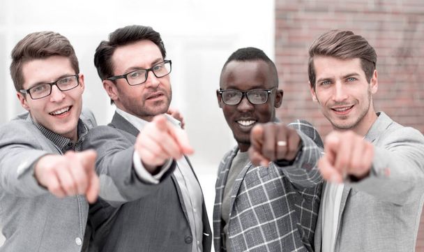 multinational business team pointing at you. - 写真・画像