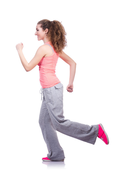 Young female doing exercises on white - Foto, Imagen