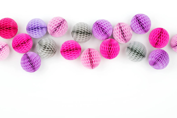 Colorful paper balls decorations on white background  - Photo, Image