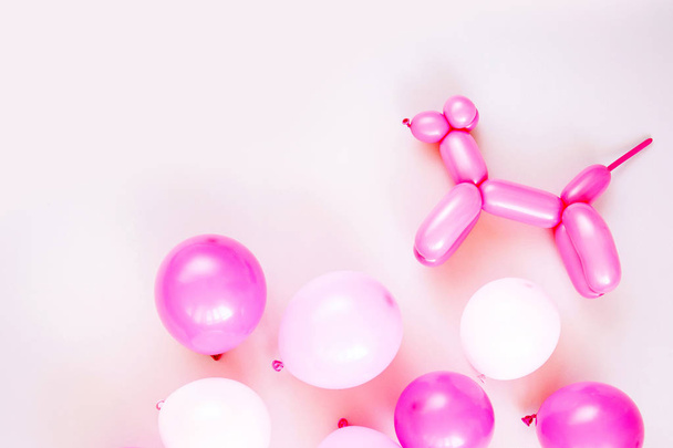 Colorful balloons on pastel color background, festive or birthday party concept - 写真・画像
