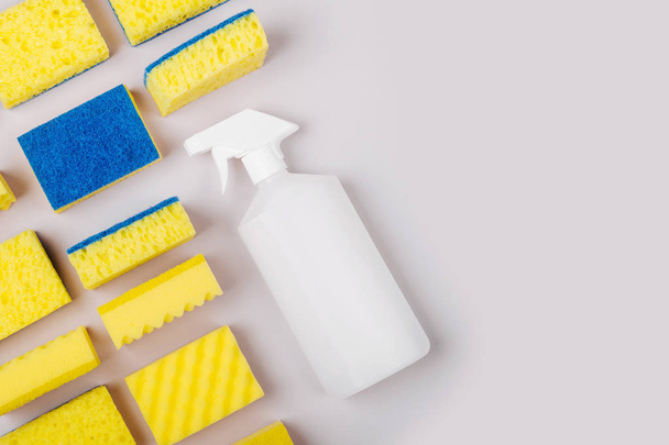 Sponges on gray background, cleaning or housekeeping concept  - Fotoğraf, Görsel