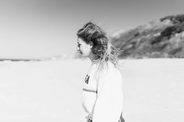 girl having fun on the beach, ocean, blue sky. - Fotografie, Obrázek