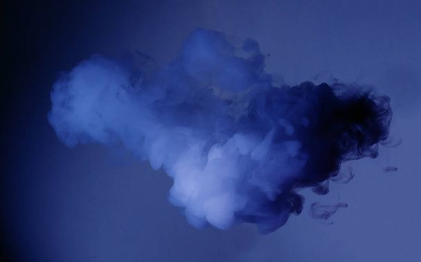 blue smoke on blue background with copy space - Φωτογραφία, εικόνα